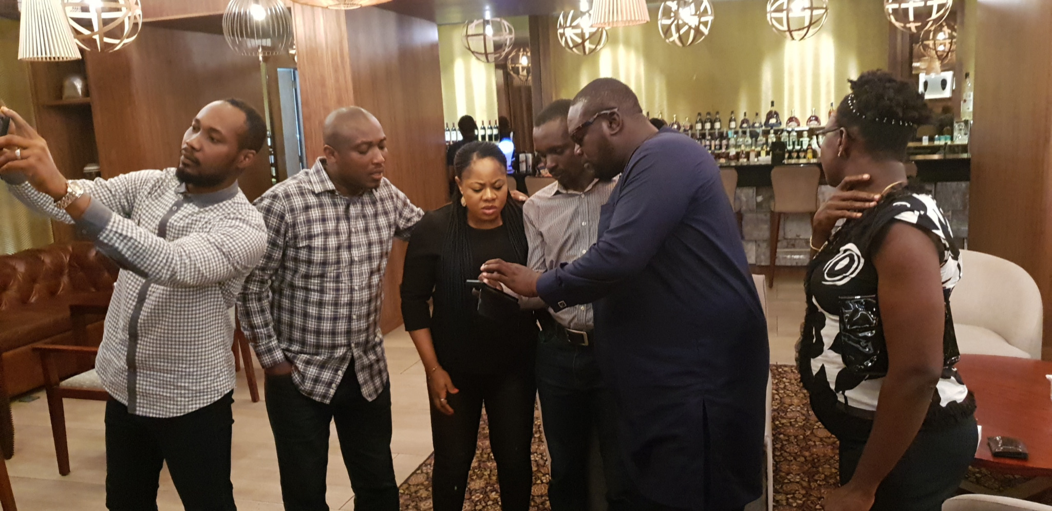 Attendees gathered during an informal conversation at the hotel