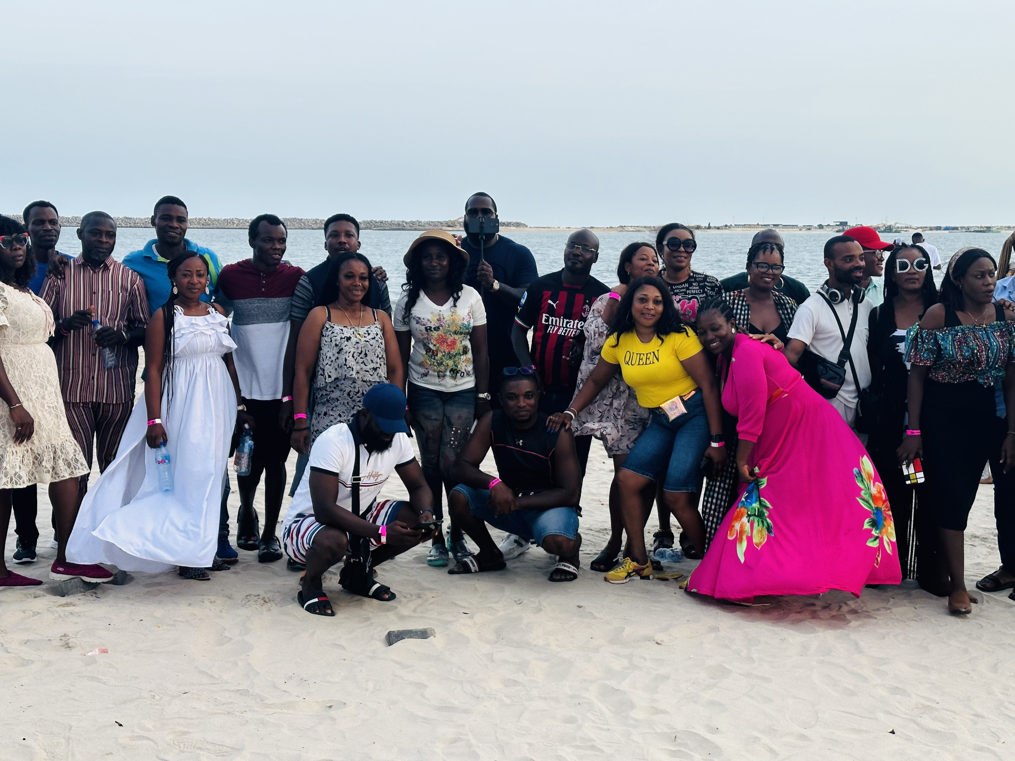 Classmates gathered together on the beach