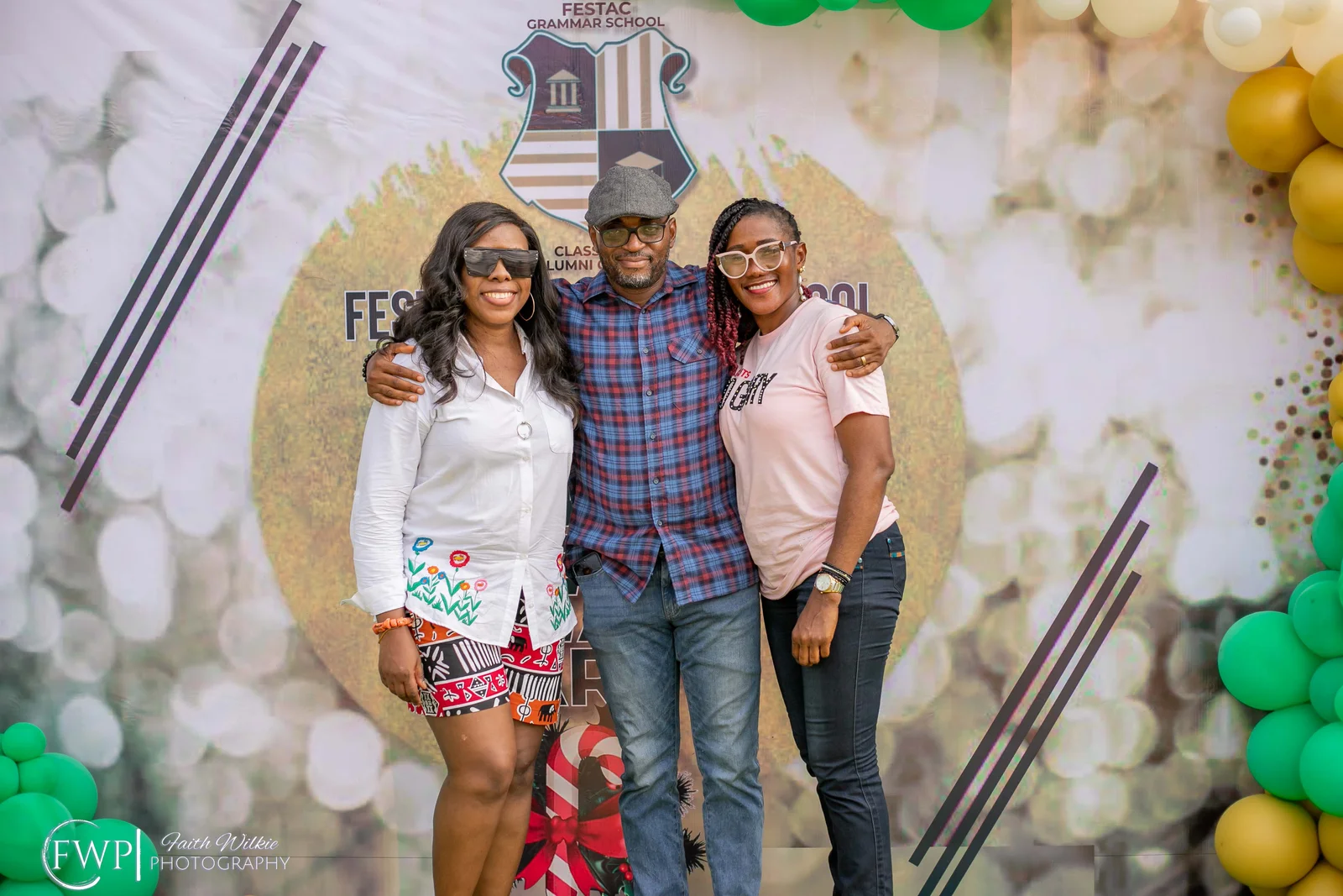 Members at the photo backdrop during the 2023 End-of-Year Party (photograph 1 of 1)