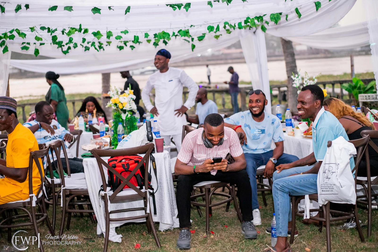 Members sharing table fellowship during the 2023 End-of-Year Party (photograph 5 of 5)