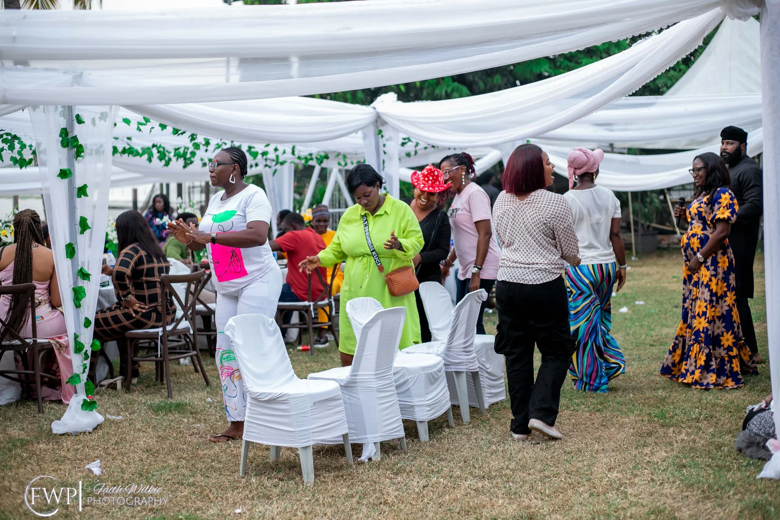 Members dancing during the year-end celebration (photograph 2 of 4)