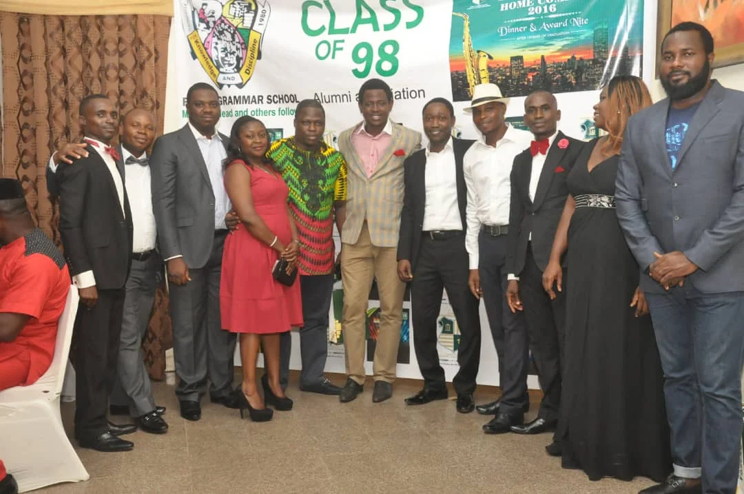 Members posing at the Class of 98 backdrop, 2016 (photograph 1 of 7)