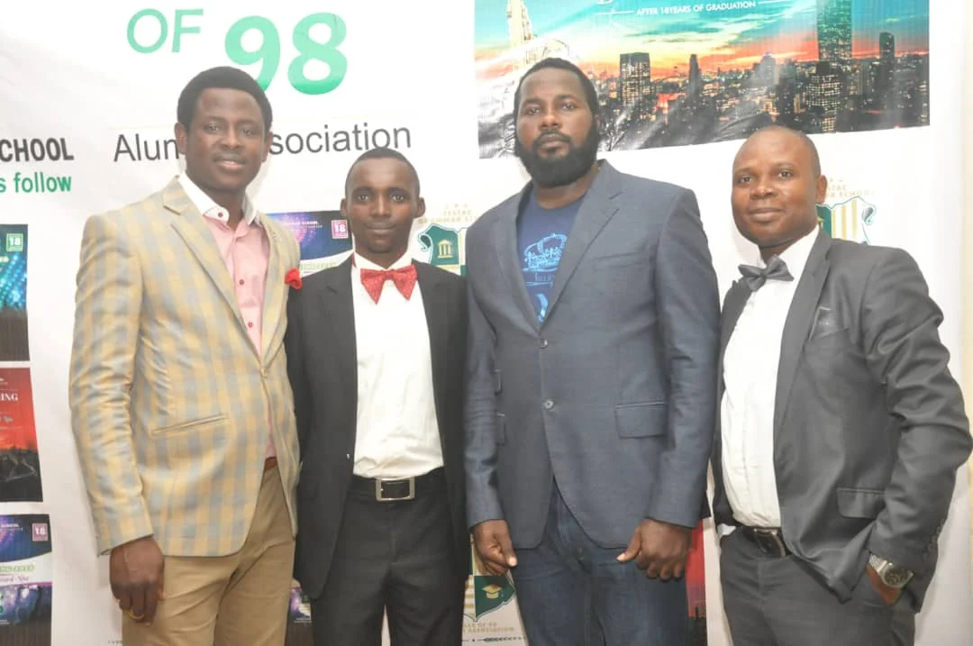 Members posing at the Class of 98 backdrop, 2016 (photograph 6 of 7)
