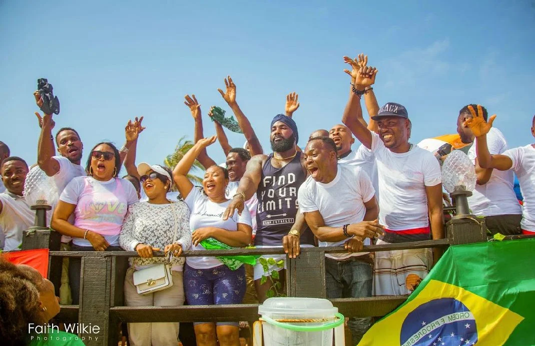 Members cheering at the railing during the Independence Day Beach Outing, 2019 (photograph 3 of 4)