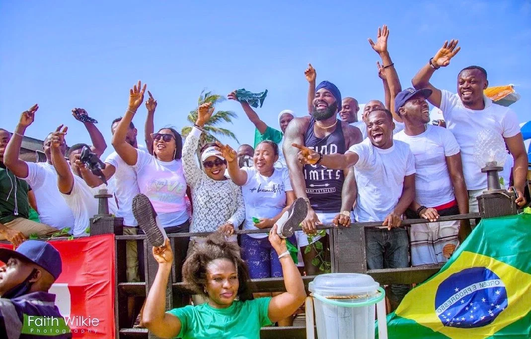 Members cheering at the railing during the Independence Day Beach Outing, 2019 (photograph 4 of 4)