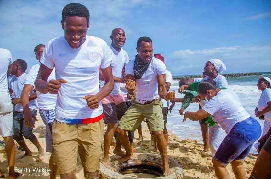 Members taking part in a tyre game on the beach, 2019 (photograph 3 of 3)