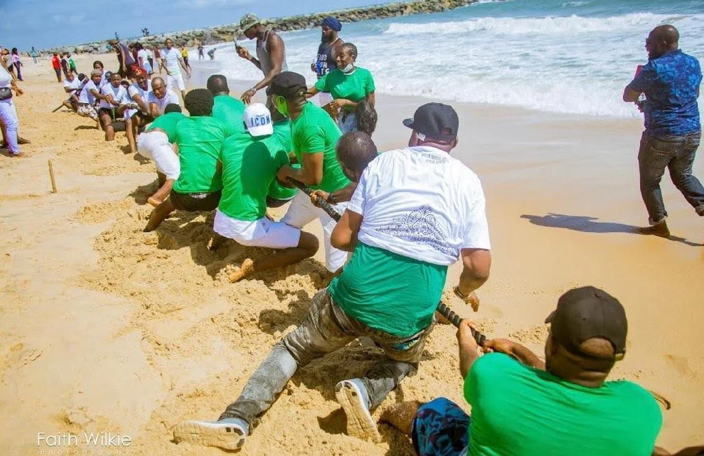 Members taking part in a tug-of-war on the beach, 2019 (photograph 1 of 1)