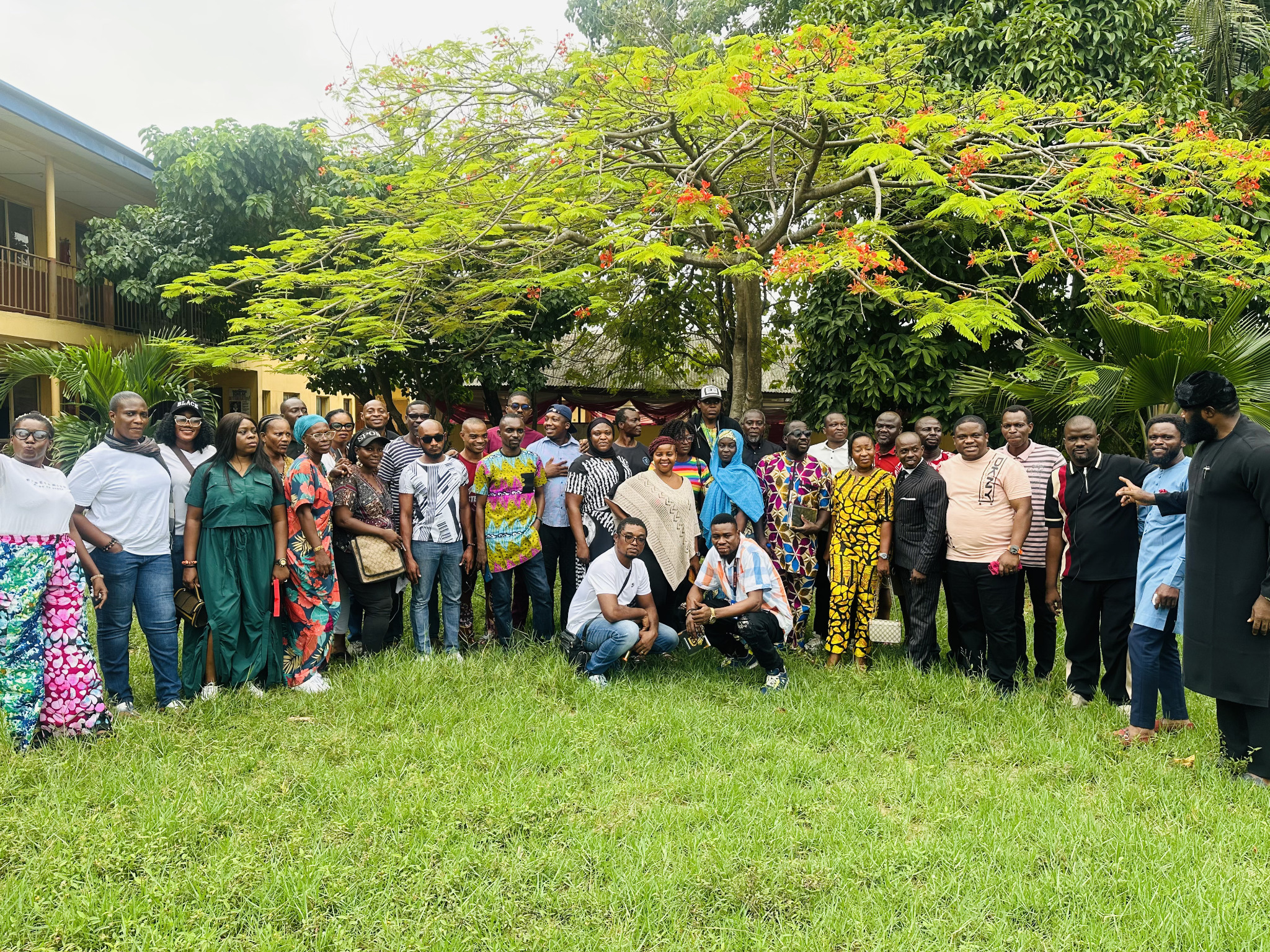 Classmates gathered on the school lawn