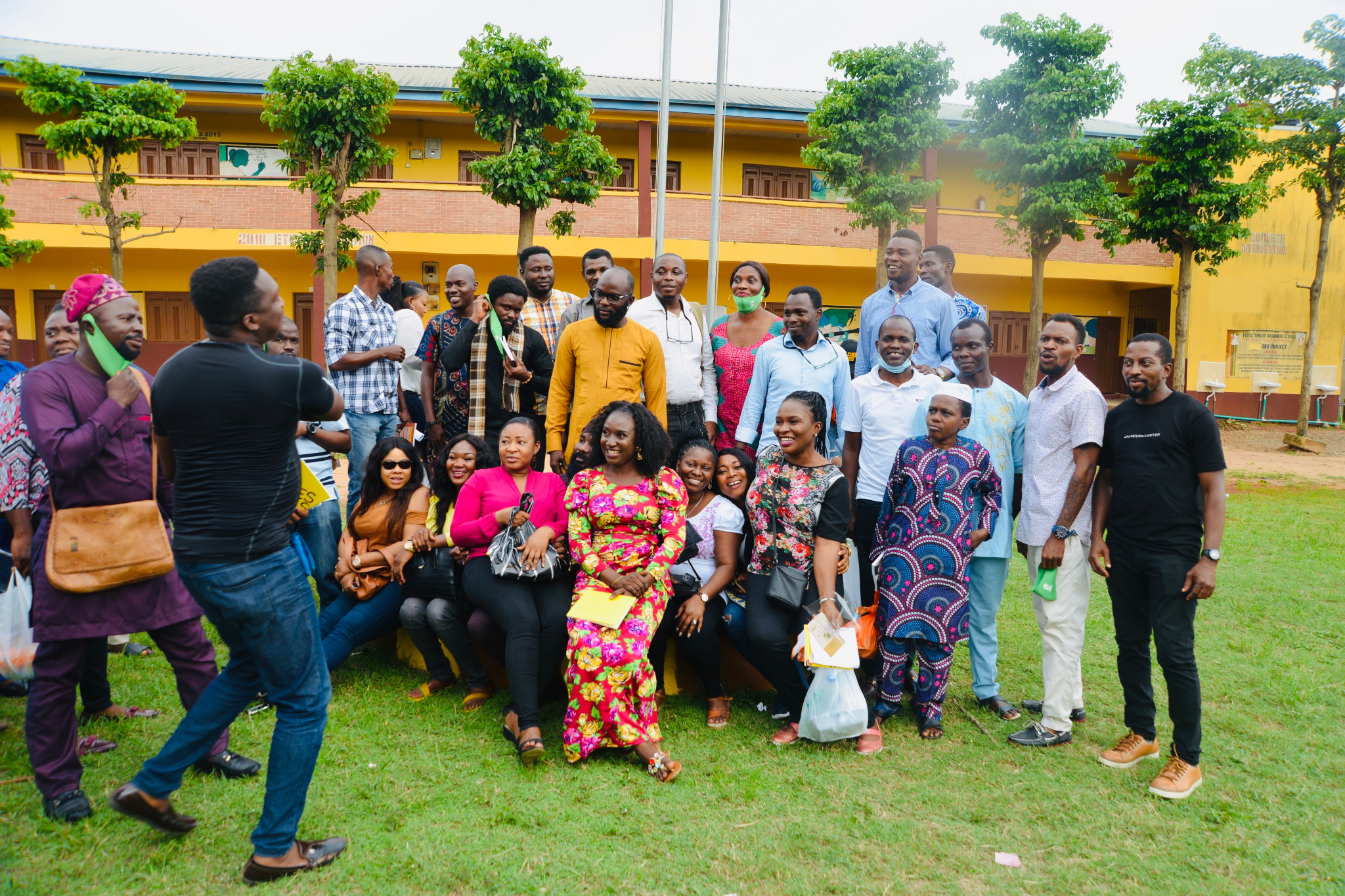 Alumni group gathered on the school lawn