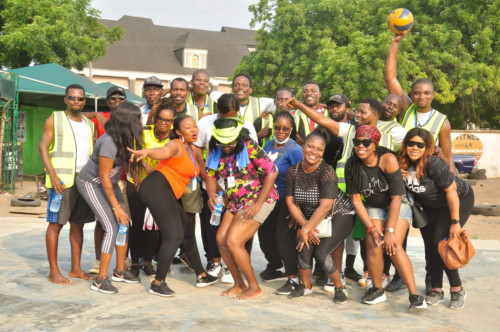FGSCAA members posing playfully together on an outdoor court during the 2020 Homecoming sports programme.