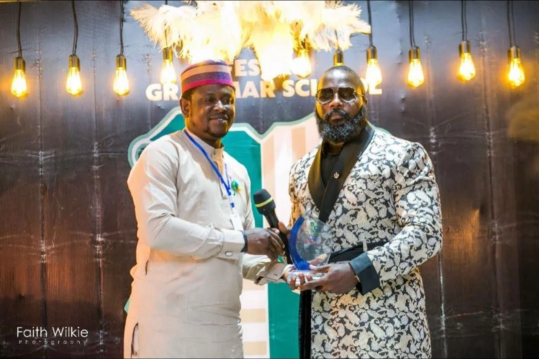 An award presentation during the reunion dinner, 2020 (photograph 1 of 4)