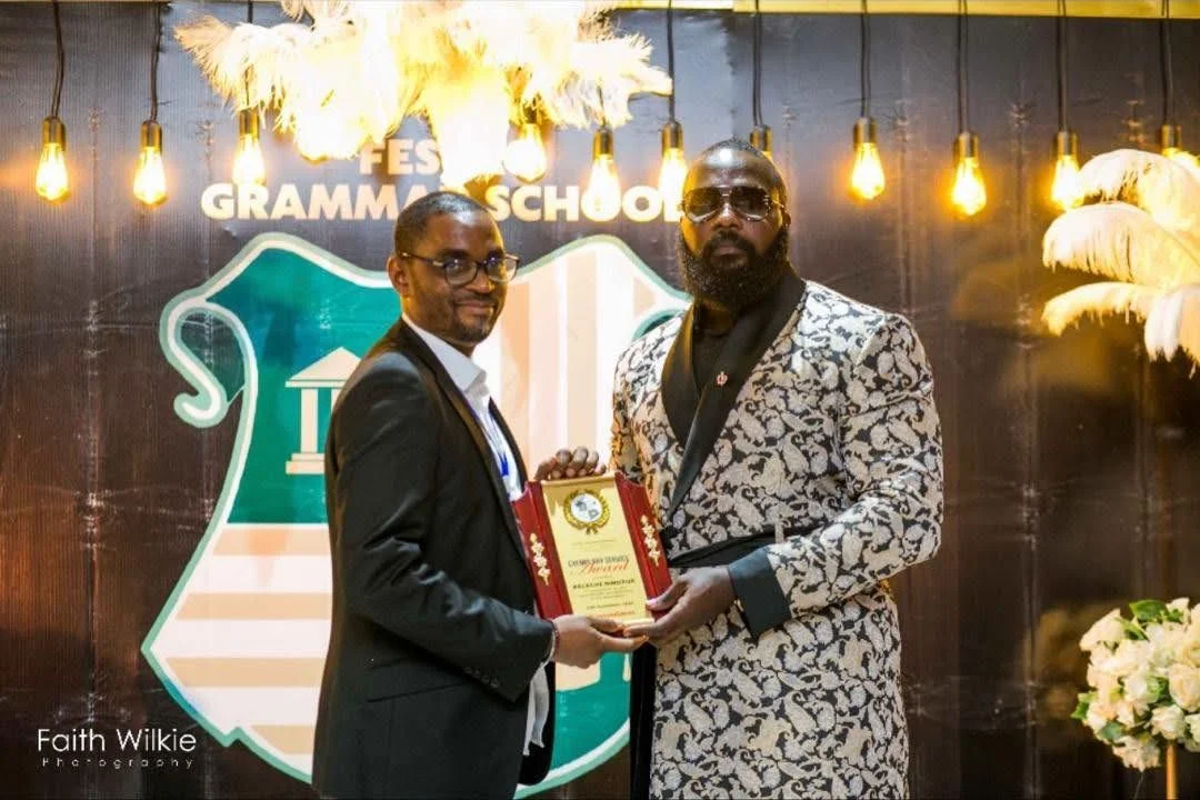 An award presentation during the reunion dinner, 2020 (photograph 2 of 4)