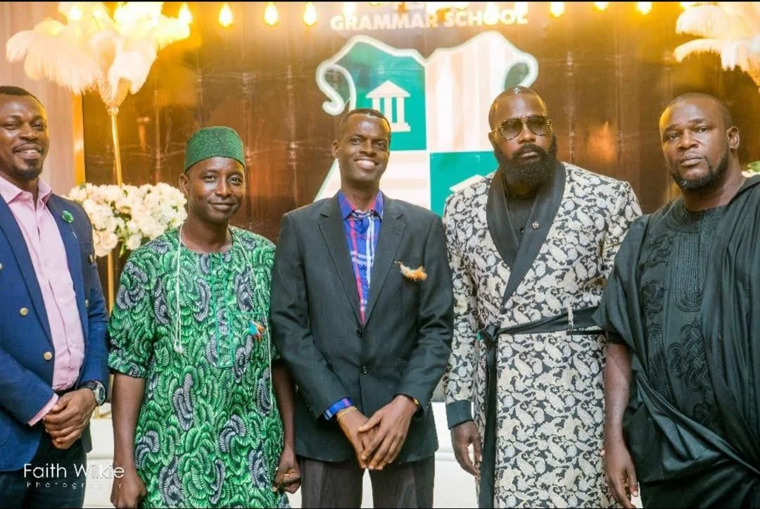 Members posing for photographs at the reunion dinner, 2020 (photograph 1 of 2)