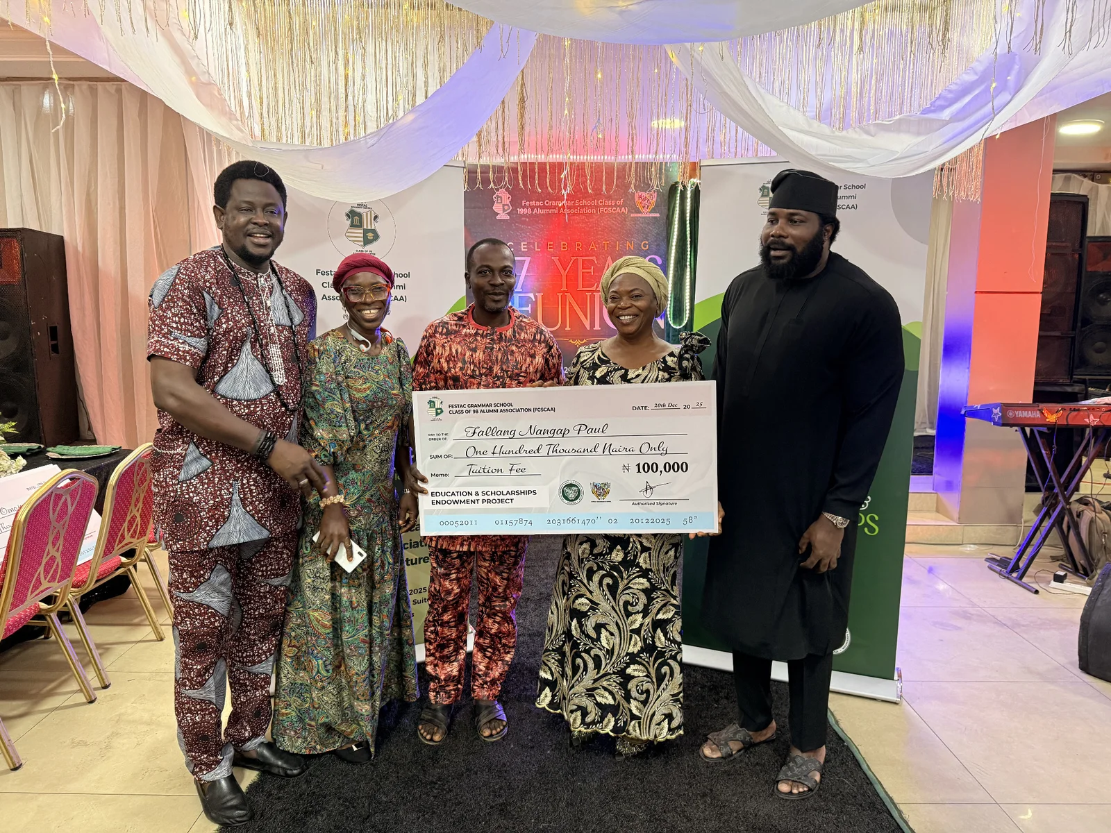 Scholarship presentation to Fallang Nangap Paul during the FGSCAA 2025 Homecoming