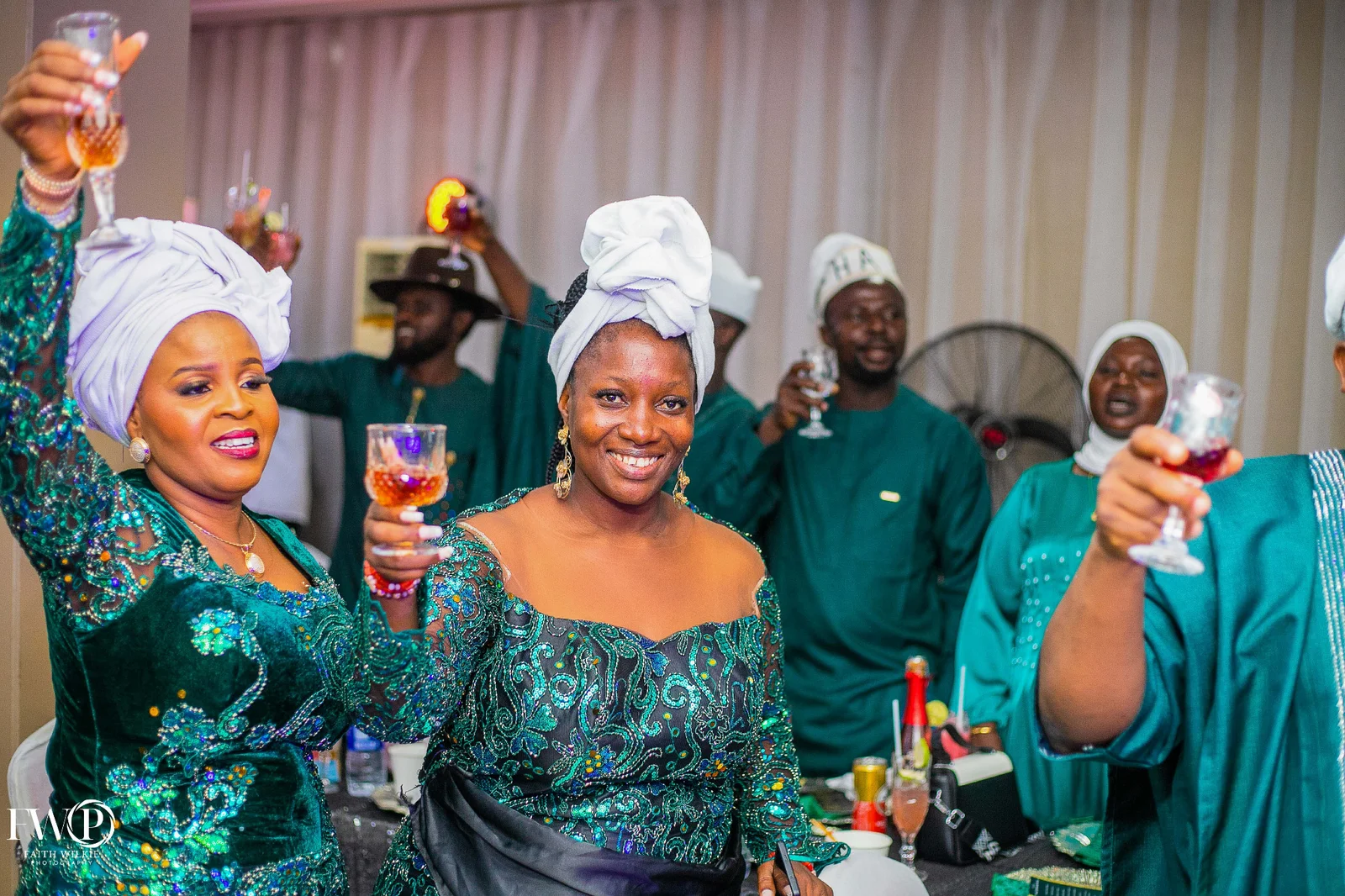 FGSCAA members raising their glasses in a celebratory toast during the 2025 reunion dinner.