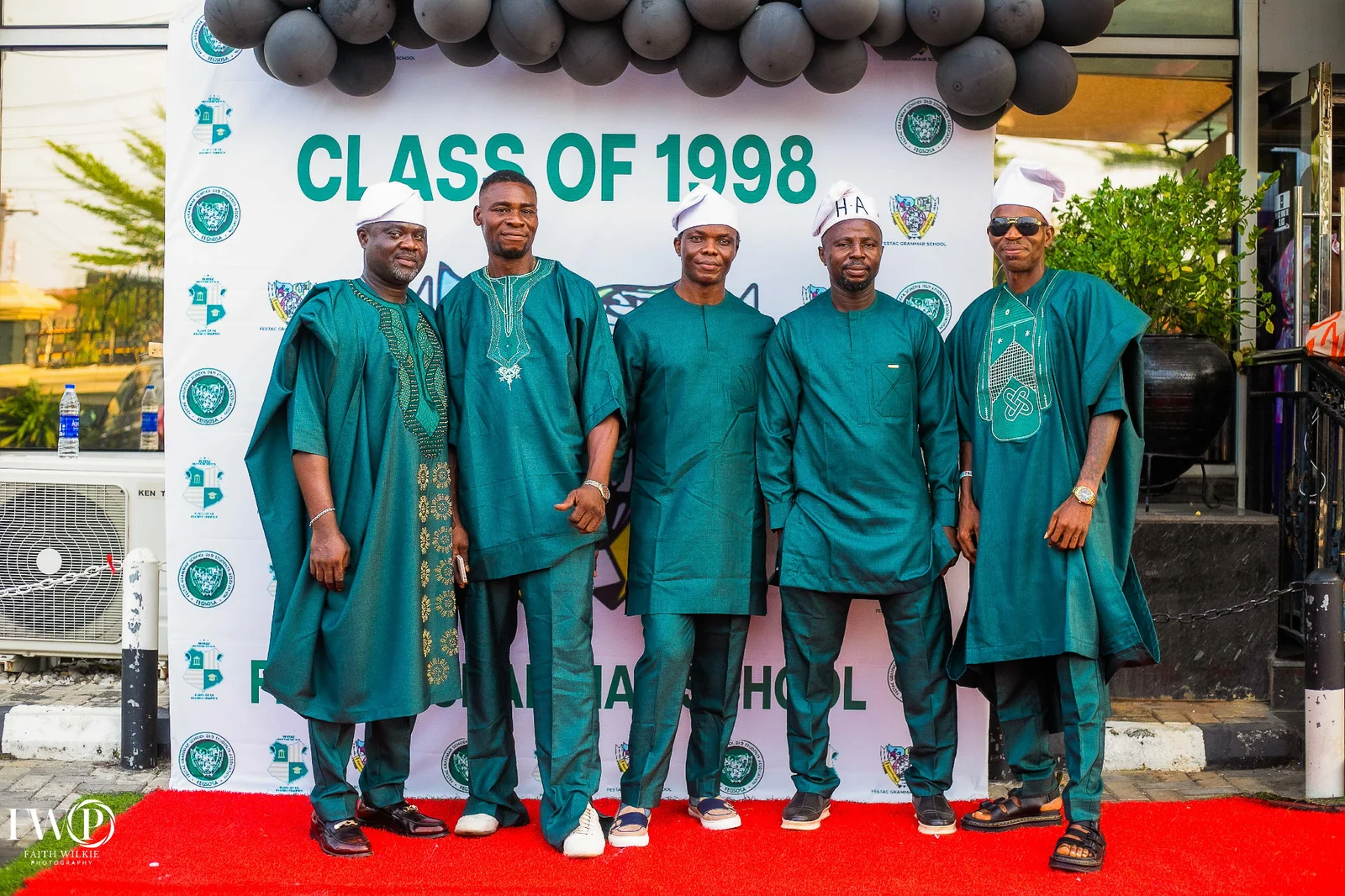 Five FGSCAA members in green attire on the red carpet in front of the Class of 1998 backdrop at the 2025 Second Homecoming Reunion.