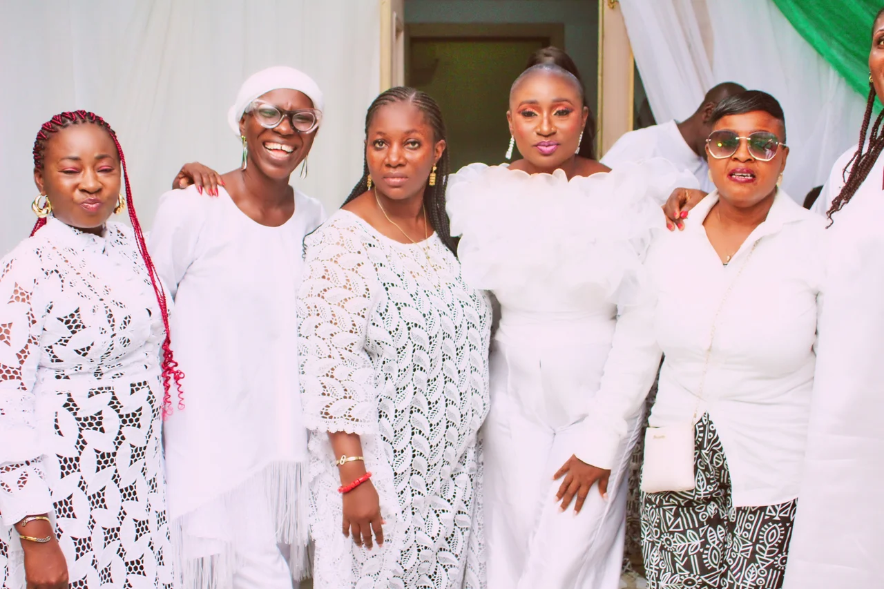 Members of the FGSCAA Social Committee in white attire standing together during the 10th Anniversary programme on 26 September 2026.