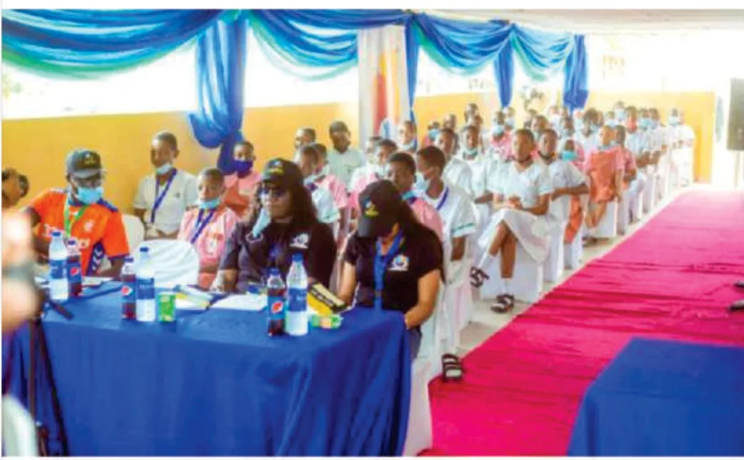 Rows of students, guests and FGSCAA representatives seated in the decorated event hall for the 2021 Spelling Bee.